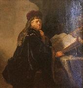 A Scholar Seated at a Desk REMBRANDT Harmenszoon van Rijn